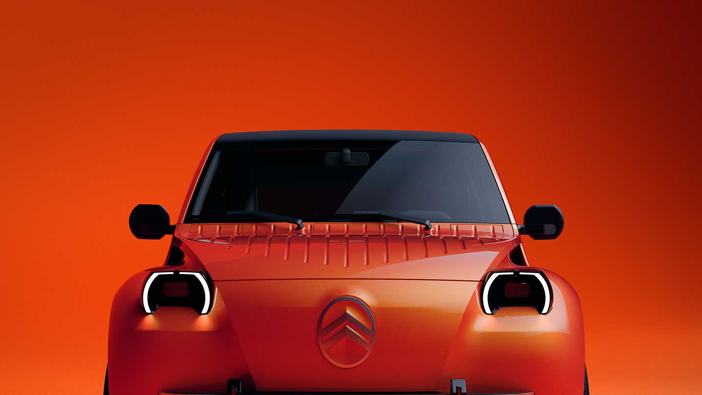 Front view of the orange Citroën 2 CV concept with round headlights and central chevrons