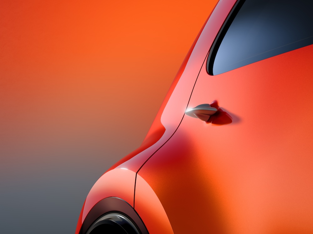 Détail de la carrosserie orange du Citroën 2CV concept